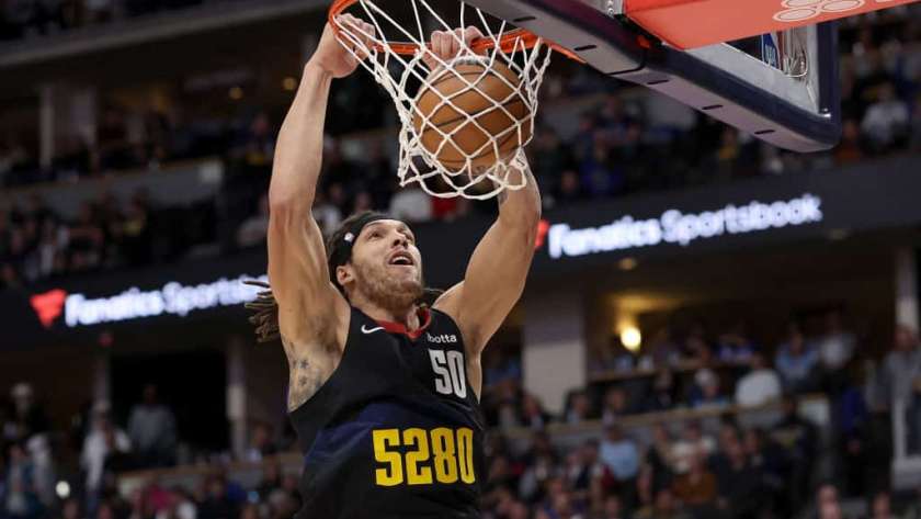Aaron Gordon #50 of the Denver Nuggets dunks against the Phoenix Suns during the third quarter at Ball Arena on March 27, 2024 in Denver, Colorado.