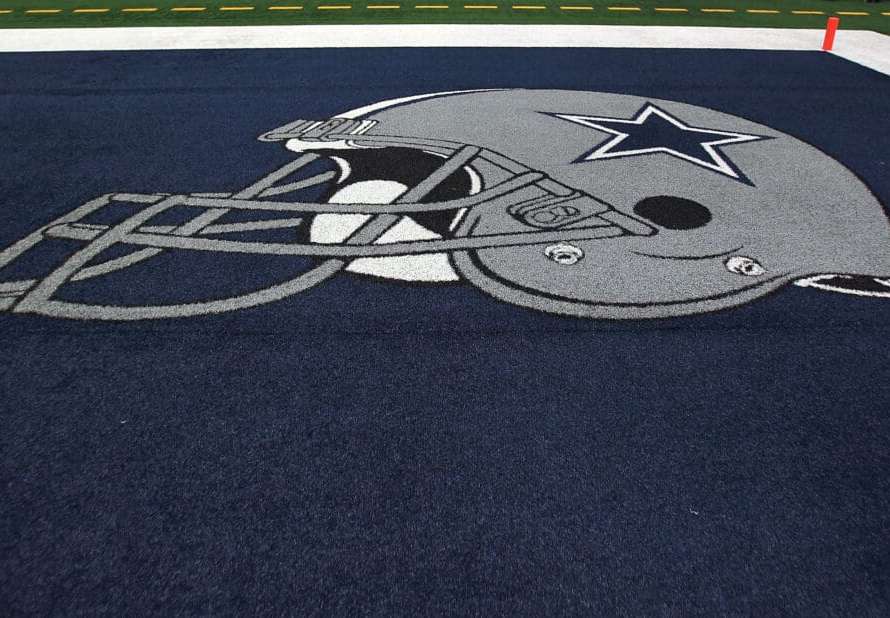 The Dallas Cowboys helmet in the endzone at Cowboys Stadium on September 26, 2011 in Arlington, Texas.