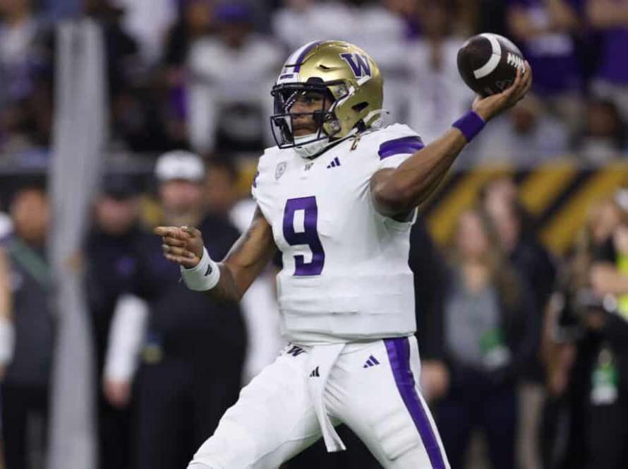 HOUSTON, TEXAS - JANUARY 08: Michael Penix Jr. #9 of the Washington Huskies throws the ball in the second half against the Michigan Wolverines during the 2024 CFP National Championship game at NRG Stadium on January 08, 2024 in Houston, Texas.