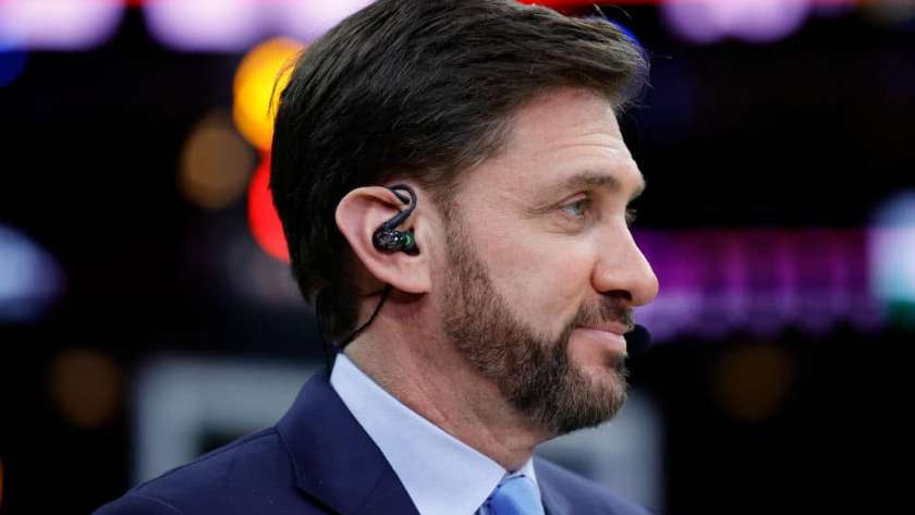 Mike Greenberg of ESPN looks on during a game between the Philadelphia 76ers and the Golden State Warriors at Wells Fargo Center on December 11, 2021 in Philadelphia, Pennsylvania.