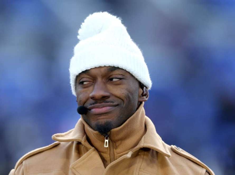 BALTIMORE, MARYLAND - JANUARY 20: Former NFL quarterback and current ESPN analyst Robert Griffin III looks on before the start of the Baltimore Ravens and Houston Texans AFC Divisional Playoff game at M&T Bank Stadium on January 20, 2024 in Baltimore, Maryland.