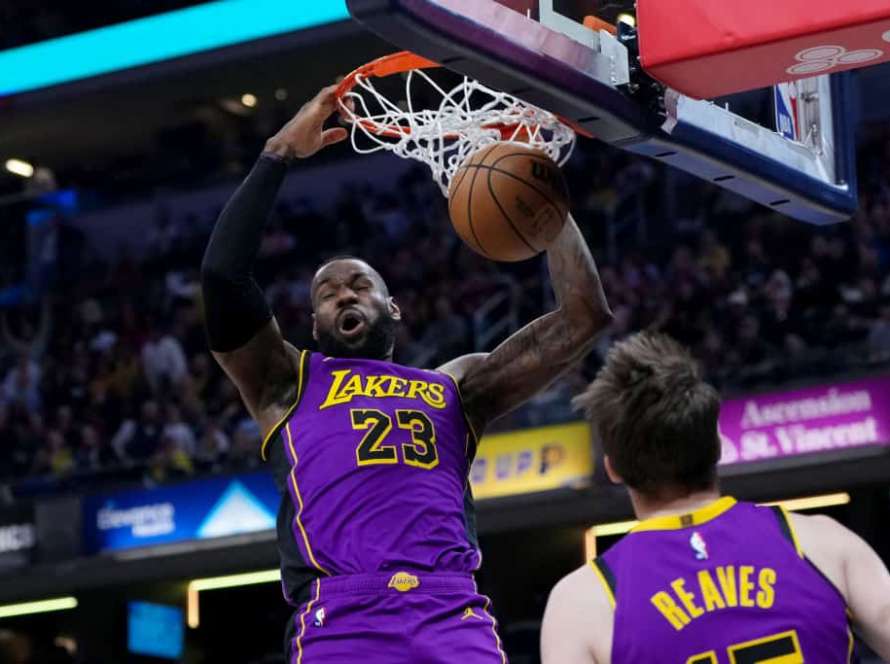 LeBron James #23 of the Los Angeles Lakers dunks the ball in the first quarter against the Indiana Pacers at Gainbridge Fieldhouse on March 29, 2024 in Indianapolis, Indiana.