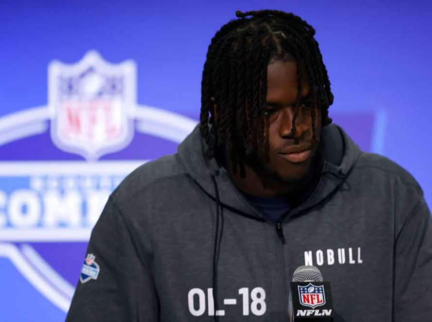 Olu Fashanu #OL18 of the Penn State Nittany Lions speaks to the media during the 2024 NFL Combine at the Indiana Convention Center on March 02, 2024 in Indianapolis, Indiana.