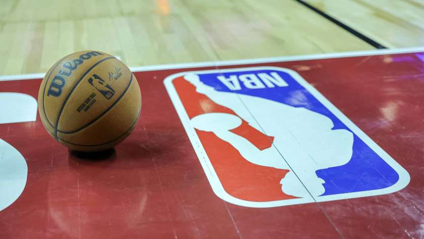 A basketball is placed on the court next to an NBA logo during a break in the first half of a 2023 NBA Summer League game between the Portland Trail Blazers and the Houston Rockets at the Thomas & Mack Center on July 07, 2023 in Las Vegas, Nevada. NOTE TO USER: User expressly acknowledges and agrees that, by downloading and or using this photograph, User is consenting to the terms and conditions of the Getty Images License Agreement.