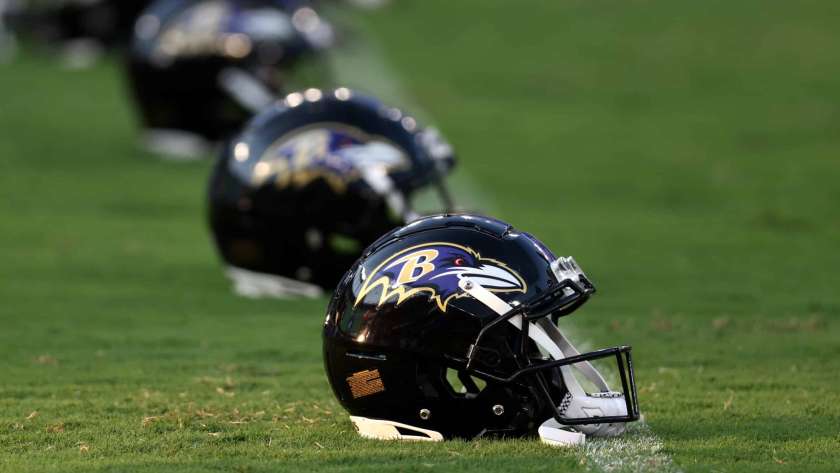 BALTIMORE, MARYLAND - AUGUST 11: Baltimore Ravens helmets sit on the field before the start of the Ravens and Tennessee Titans preseason game at M&T Bank Stadium on August 11, 2022 in Baltimore, Maryland.