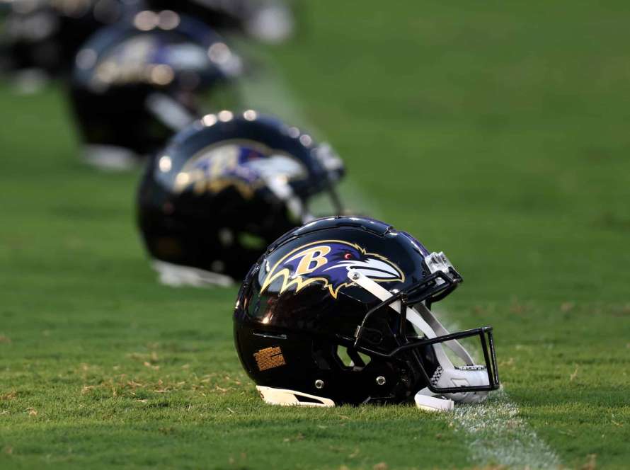 BALTIMORE, MARYLAND - AUGUST 11: Baltimore Ravens helmets sit on the field before the start of the Ravens and Tennessee Titans preseason game at M&T Bank Stadium on August 11, 2022 in Baltimore, Maryland.