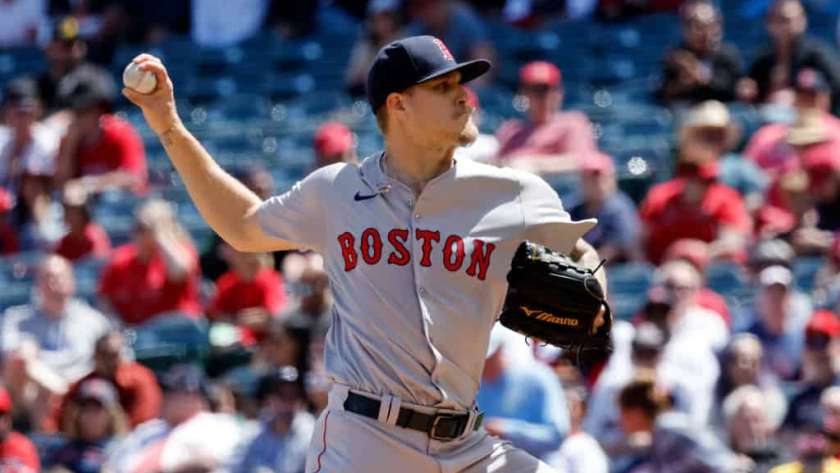 Pitcher Tanner Houck #89 of the Boston Red Sox trows during the first inning against the against the Los Angeles Angels at Angel Stadium of Anaheim on April 7, 2024 in Anaheim, California.