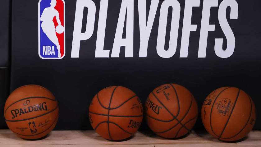 Basketballs are lined up under the NBA Playoffs logo before the start of a game between the Toronto Raptors and the Brooklyn Nets in Game One of the Eastern Conference First Round during the 2020 NBA Playoffs at AdventHealth Arena at ESPN Wide World Of Sports Complex on August 17, 2020 in Lake Buena Vista, Florida.