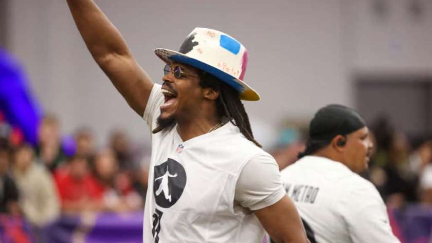 Former NFL quarterback Cam Newton celebrates during a celebrity flag football game at the Mandalay Bay Convention Center on February 09, 2024 in Las Vegas, Nevada.