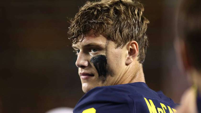 ANN ARBOR, MICHIGAN - SEPTEMBER 10: J.J. McCarthy #9 of the Michigan Wolverines looks on from the sidelines while playing the Hawaii Warriors at Michigan Stadium on September 10, 2022 in Ann Arbor, Michigan.