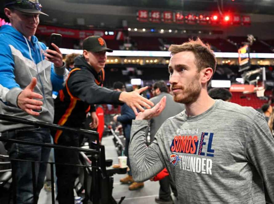 Gordon Hayward #33 of the Oklahoma City Thunder high-fives fans after the game against the Portland Trail Blazers at the Moda Center on March 06, 2024 in Portland, Oregon. The Oklahoma City Thunder won 128-120.