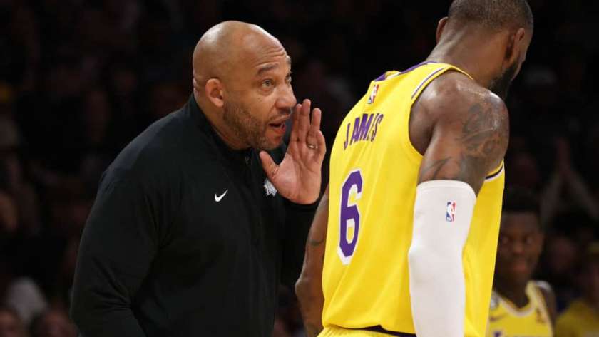 Head coach Darvin Ham speaks to LeBron James #6 of the Los Angeles Lakers during the first quarter against the Denver Nuggets in game four of the Western Conference Finals at Crypto.com Arena on May 22, 2023 in Los Angeles, California.