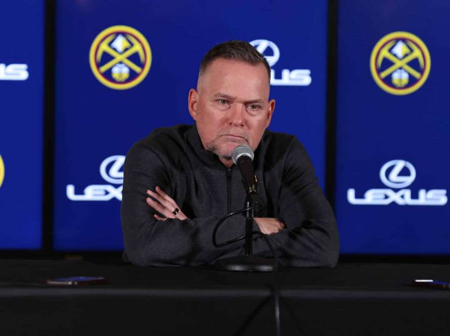 Denver Nuggets head coach Michael Malone speaks in a pre-game press conference before the game against the Los Angeles Lakers at Ball Arena on October 24, 2023 in Denver, Colorado.