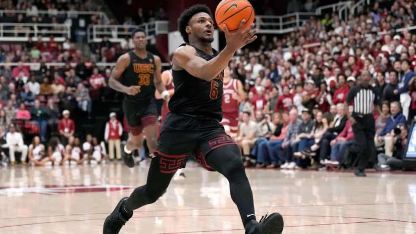 Bronny James #6 of the USC Trojans drives to the basket on a fast break against the Stanford Cardinal during the second half of an NCAA basketball game at Stanford Maples Pavilion on February 10, 2024 in Palo Alto, California.