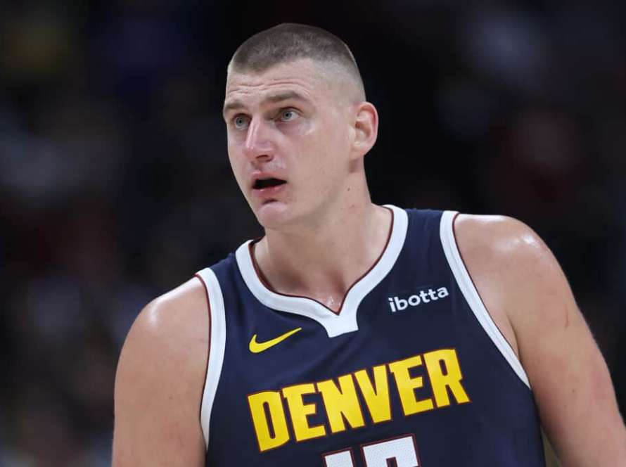 DENVER, COLORADO - NOVEMBER 08: Nikola Jokic #15 of the Denver Nuggets plays the Golden State Warriors in the fourth quarter at Ball Arena on November 08, 2023 in Denver, Colorado. NOTE TO USER: User expressly acknowledges and agrees that, by downloading and or using this photograph, User is consenting to the terms and conditions of the Getty Images License Agreement.