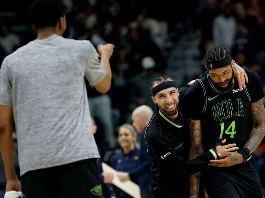 Jose Alvarado #15 of the New Orleans Pelicans reacts with Brandon Ingram #14 of the New Orleans Pelicans during the third quarter of an NBA game against the Indiana Pacers at Smoothie King Center on March 01, 2024 in New Orleans, Louisiana.