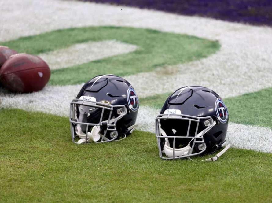 Tennessee Titans helmets sit on the field before the start of the Titans and Baltimore Ravens game at M&T Bank Stadium on November 22, 2020 in Baltimore, Maryland.