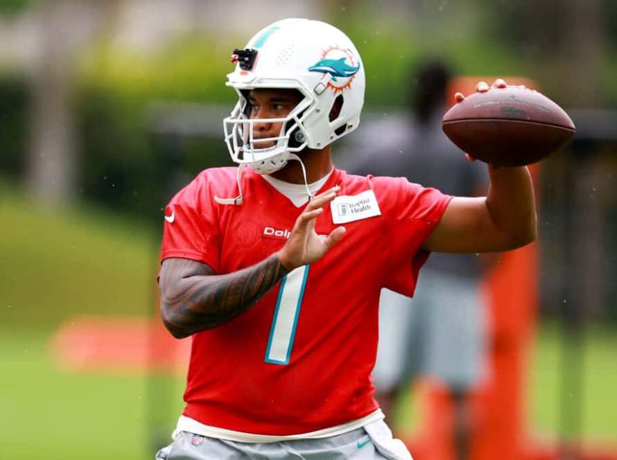Tua Tagovailoa #1 of the Miami Dolphins throws a pass during training camp at Baptist Health Training Complex on July 26, 2023 in Miami Gardens, Florida.
