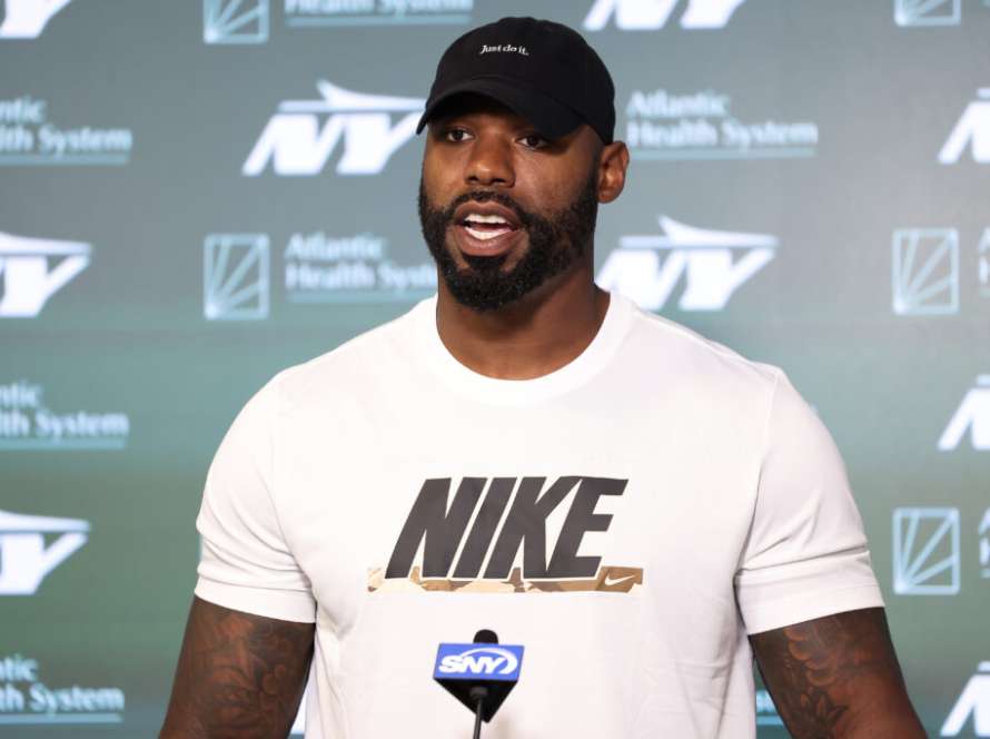 FLORHAM PARK, NEW JERSEY - JUNE 11: Tyron Smith #77 of the New York Jets speaks to the media during New York Jets Mandatory Minicamp at Atlantic Health Jets Training Center on June 11, 2024 in Florham Park, New Jersey.