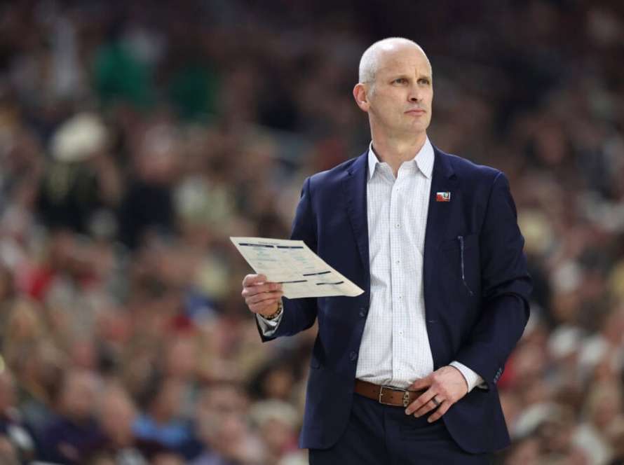 GLENDALE, ARIZONA - APRIL 06: Head coach Dan Hurley of the Connecticut Huskies walks across the court in the first half against the Alabama Crimson Tide in the NCAA Men's Basketball Tournament Final Four semifinal game at State Farm Stadium on April 06, 2024 in Glendale, Arizona.