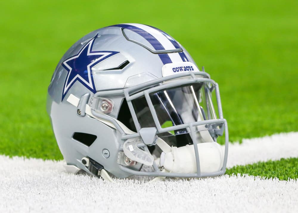 Dallas Cowboys helmet sits on the field during the football game between the Dallas Cowboys and Houston Texans on August 30, 2018 at NRG Stadium in Houston, Texas.