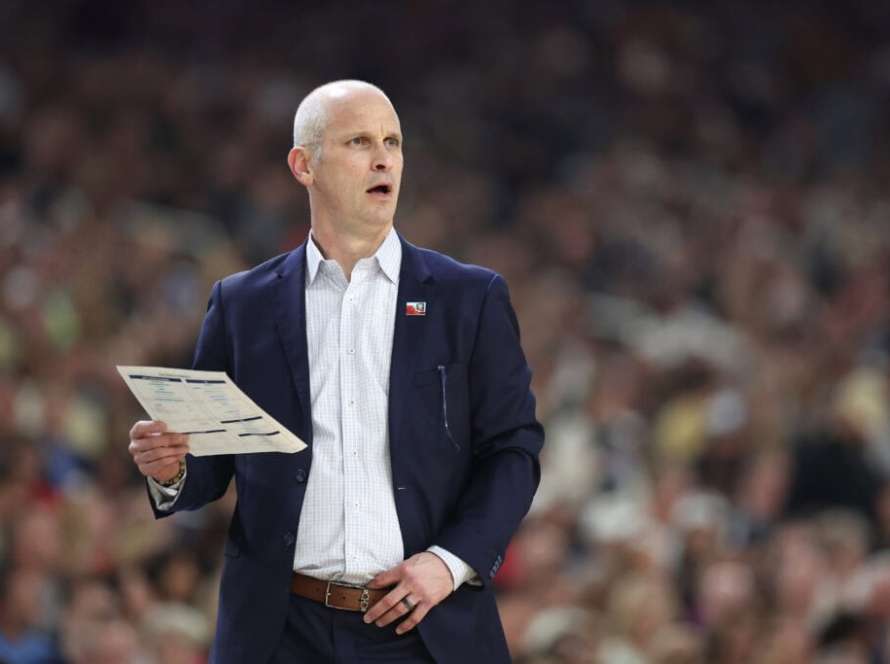 GLENDALE, ARIZONA - APRIL 06: Head coach Dan Hurley of the Connecticut Huskies walks across the court in the first half against the Alabama Crimson Tide in the NCAA Men's Basketball Tournament Final Four semifinal game at State Farm Stadium on April 06, 2024 in Glendale, Arizona.