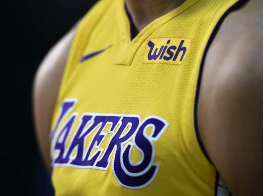 Lonzo Ball #2 of the Los Angeles Lakers wears his new Nike jersey with the sponsor's logo "Wish" on the left chests during media day September 25, 2017, in El Segundo, California. NOTE TO USER: User expressly acknowledges and agrees that, by downloading and/or using this photograph, user is consenting to the terms and conditions of the Getty Images License Agreement.