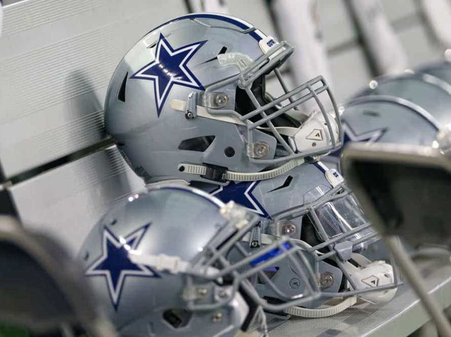 Dallas Cowboys helmets line the benches during the Thanksgiving Day game between the Washington Redskins and Dallas Cowboys on November 22, 2018 at AT&T Stadium in Arlington, TX.