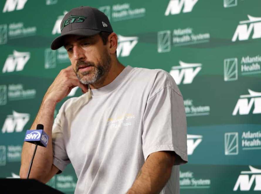 FLORHAM PARK, NEW JERSEY - MAY 21: Aaron Rodgers #8 of the New York Jets speaks to the media during the New York Jets OTA Offseason Workout at Atlantic Health Jets Training Center on May 21, 2024 in Florham Park, New Jersey.