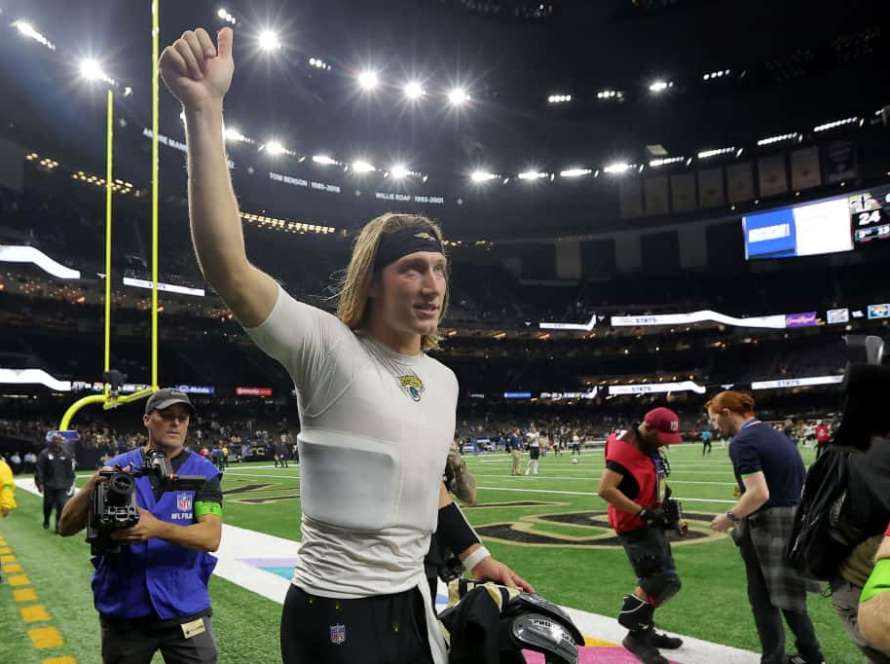 Trevor Lawrence #16 of the Jacksonville Jaguars celebrates as he leaves the field after defeating the New Orleans Saints 31-24 at Caesars Superdome on October 19, 2023 in New Orleans, Louisiana.