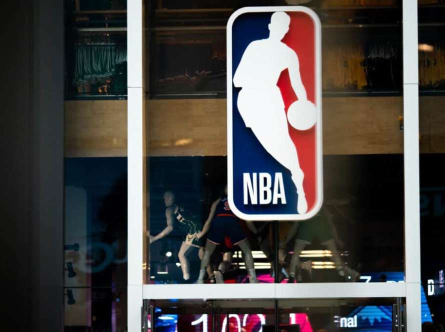 An NBA logo is shown at the 5th Avenue NBA store on March 12, 2020 in New York City. The National Basketball Association said they would suspend all games after player Rudy Gobert of the Utah Jazz reportedly tested positive for the Coronavirus (COVID-19).