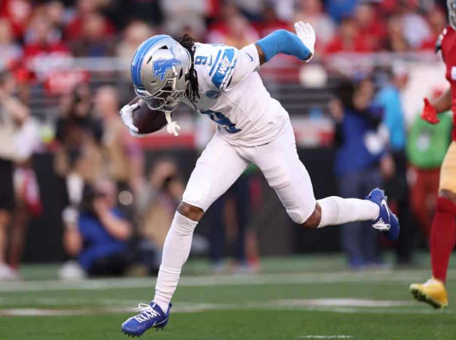 Jameson Williams #9 of the Detroit Lions runs the ball for a touchdown during the first quarter against the San Francisco 49ers in the NFC Championship Game at Levi's Stadium on January 28, 2024 in Santa Clara, California.