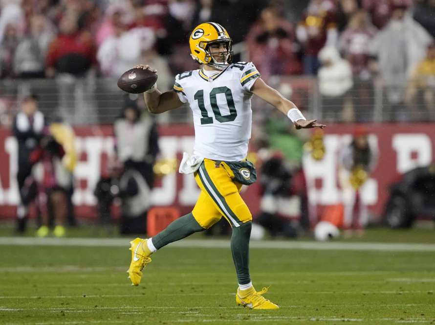 SANTA CLARA, CALIFORNIA - JANUARY 20: Jordan Love #10 of the Green Bay Packers looks to pass during the first half against the San Francisco 49ers in the NFC Divisional Playoffs at Levi's Stadium on January 20, 2024 in Santa Clara, California.