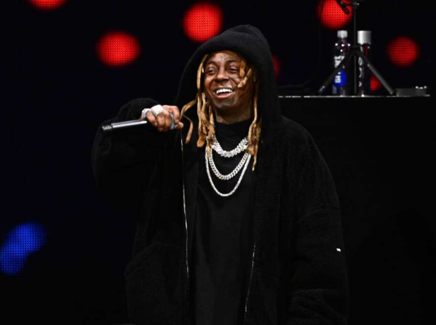 CHICAGO, ILLINOIS - DECEMBER 04: Lil Wayne performs onstage during iHeartRadio 103.5 KISS FM's Jingle Ball 2023 on December 04, 2023 in Chicago, Illinois.