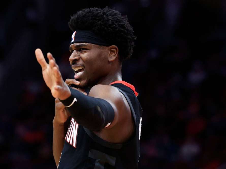 Aaron Holiday #0 of the Houston Rockets reacts against the Portland Trail Blazers during the first half at Toyota Center on January 24, 2024 in Houston, Texas.