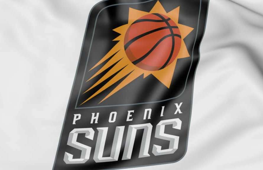 Close-up of waving flag with Phoenix Suns NBA basketball team logo, United States
