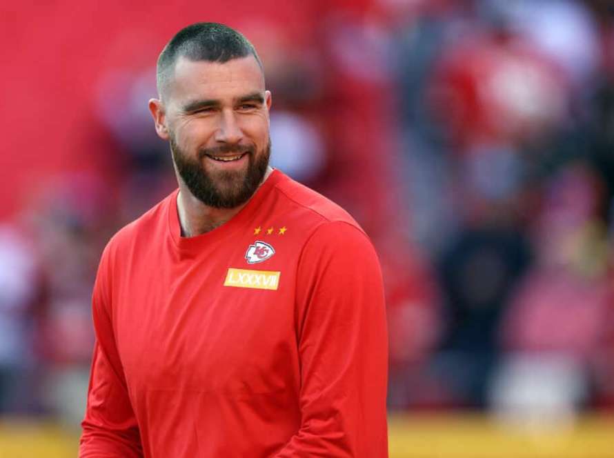 KANSAS CITY, MISSOURI - DECEMBER 10: Tight end Travis Kelce #87 of the Kansas City Chiefs warms up prior to the game between the Buffalo Bills and the Kansas City Chiefs at GEHA Field at Arrowhead Stadium on December 10, 2023 in Kansas City, Missouri.