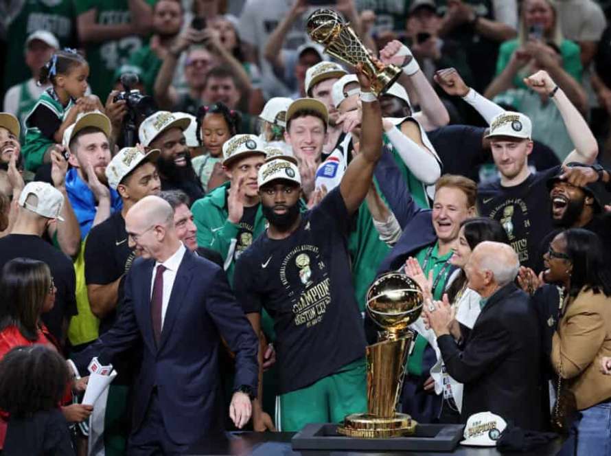 STON, MASSACHUSETTS - JUNE 17: Jaylen Brown #7 of the Boston Celtics holds up the Bill Russell NBA Finals Most Valuable Player award after Boston's 106-88 win against the Dallas Mavericks in Game Five of the 2024 NBA Finals at TD Garden on June 17, 2024 in Boston, Massachusetts. NOTE TO USER: User expressly acknowledges and agrees that, by downloading and or using this photograph, User is consenting to the terms and conditions of the Getty Images License Agreement.