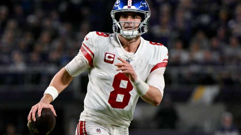 Daniel Jones #8 of the New York Giants looks to pass against the Minnesota Vikings during the first half in the NFC Wild Card playoff game at U.S. Bank Stadium on January 15, 2023 in Minneapolis, Minnesota.