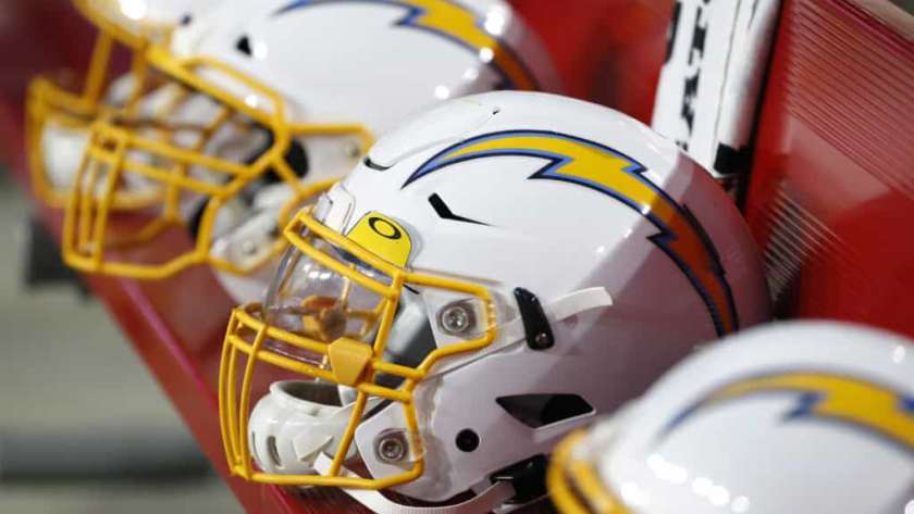 Los Angeles Chargers helmets on the bench prior to the start of the NFL preseason game the Arizona Cardinals at State Farm Stadium on August 08, 2019 in Glendale, Arizona.