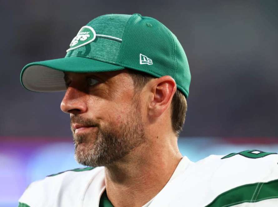 Aaron Rodgers #8 of the New York Jets looks on from the sideline during a preseason game against the New York Giants at MetLife Stadium on August 26, 2023 in East Rutherford, New Jersey.