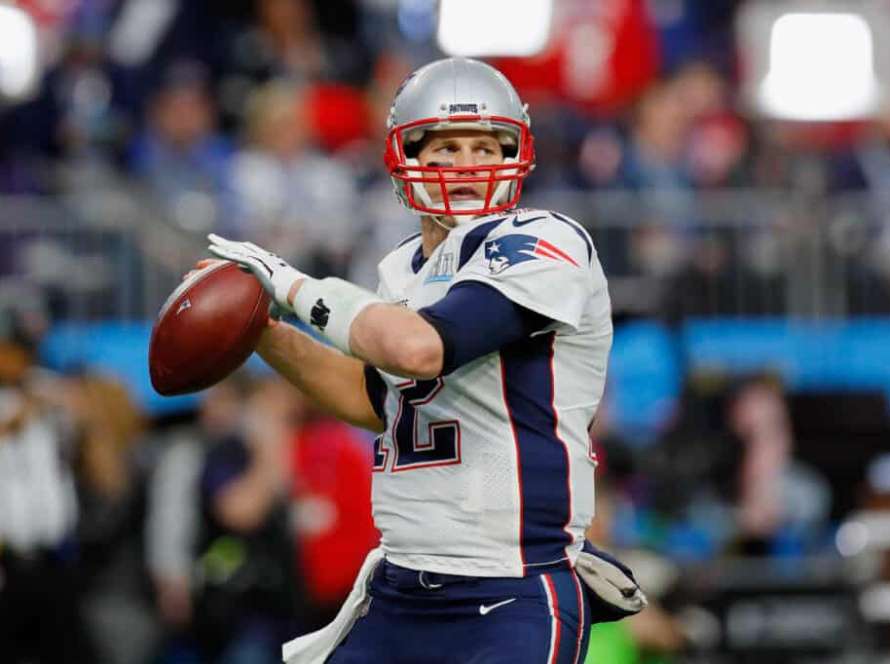Tom Brady #12 of the New England Patriots warms up prior to Super Bowl