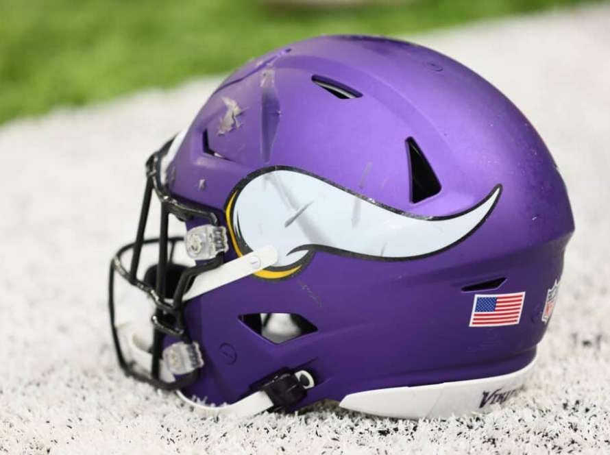A Minnesota Vikings helmet on the field before a practice at U.S. Bank Stadium on August 07, 2021 in Minneapolis, Minnesota.